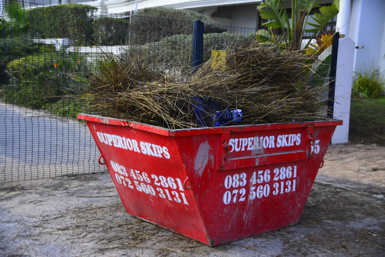 A full skip ready for collection